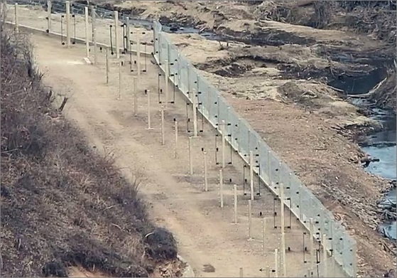 Barbed wire fences are seen installed in a border area in this file photo provided by South Korea's Joint Chiefs of Staff on Dec. 23, 2024. [JOINT CHIEFS OF STAFF]