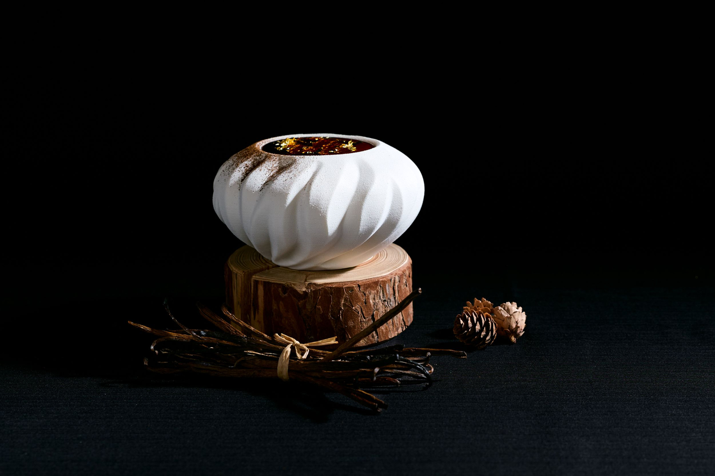 Crystal Vanilla, a smoked-vanilla cake with cacao nibs and an Oabika glaze for a smoky, subtly sweet finish [FOUR SEASONS HOTEL SEOUL]