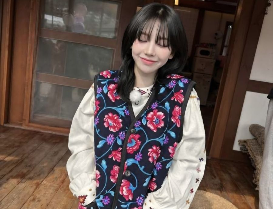 Karina, a member of girl group aespa, wears a floral vest commonly associated with Korean grandmothers in this photo uploaded to the singer's Instagram. [SCREEN CAPTURE]