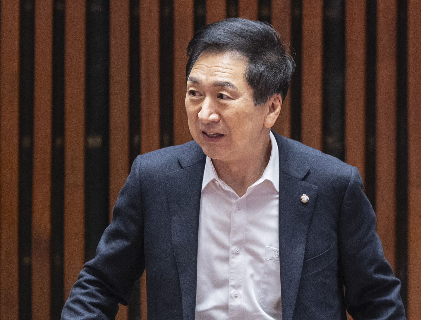 Rep. Kim Gi-hyeon of the People Power Party prepares to attend a party meeting at the National Assembly building in western Seoul on Dec. 22, 2025. [YONHAP] 
