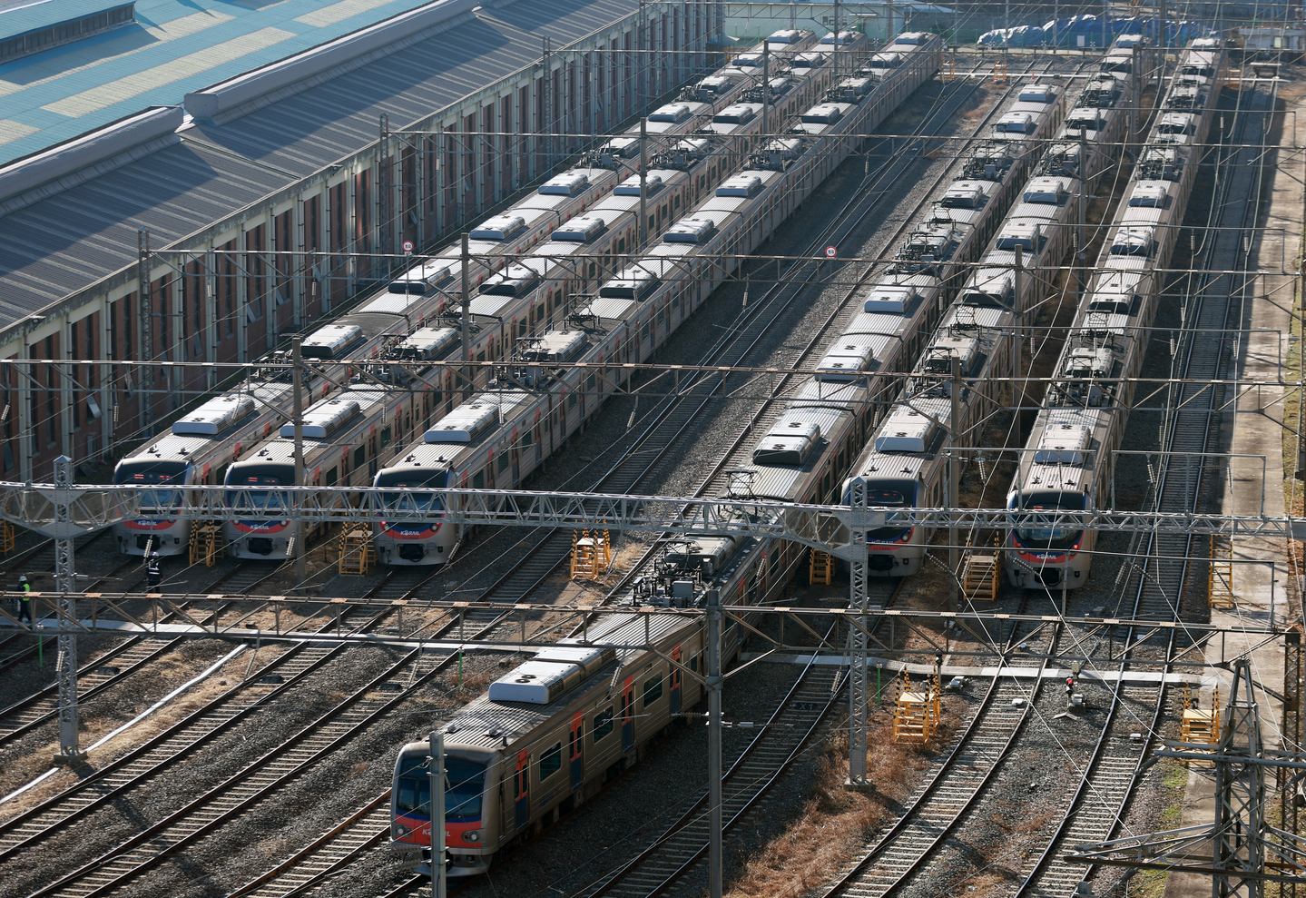Trains are seen parked at a lot in Guro District, southern Seoul, on Dec. 22. [YONHAP] 