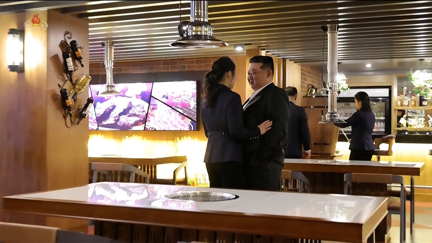 North Korean leader Kim Jong-un, right, tours the restaurant facilities with his daughter, Kim Ju-ae, during the completion ceremony of the Milyong Hotel in Samjiyon on Dec. 20. [KOREAN CENTRAL TELEVISION]