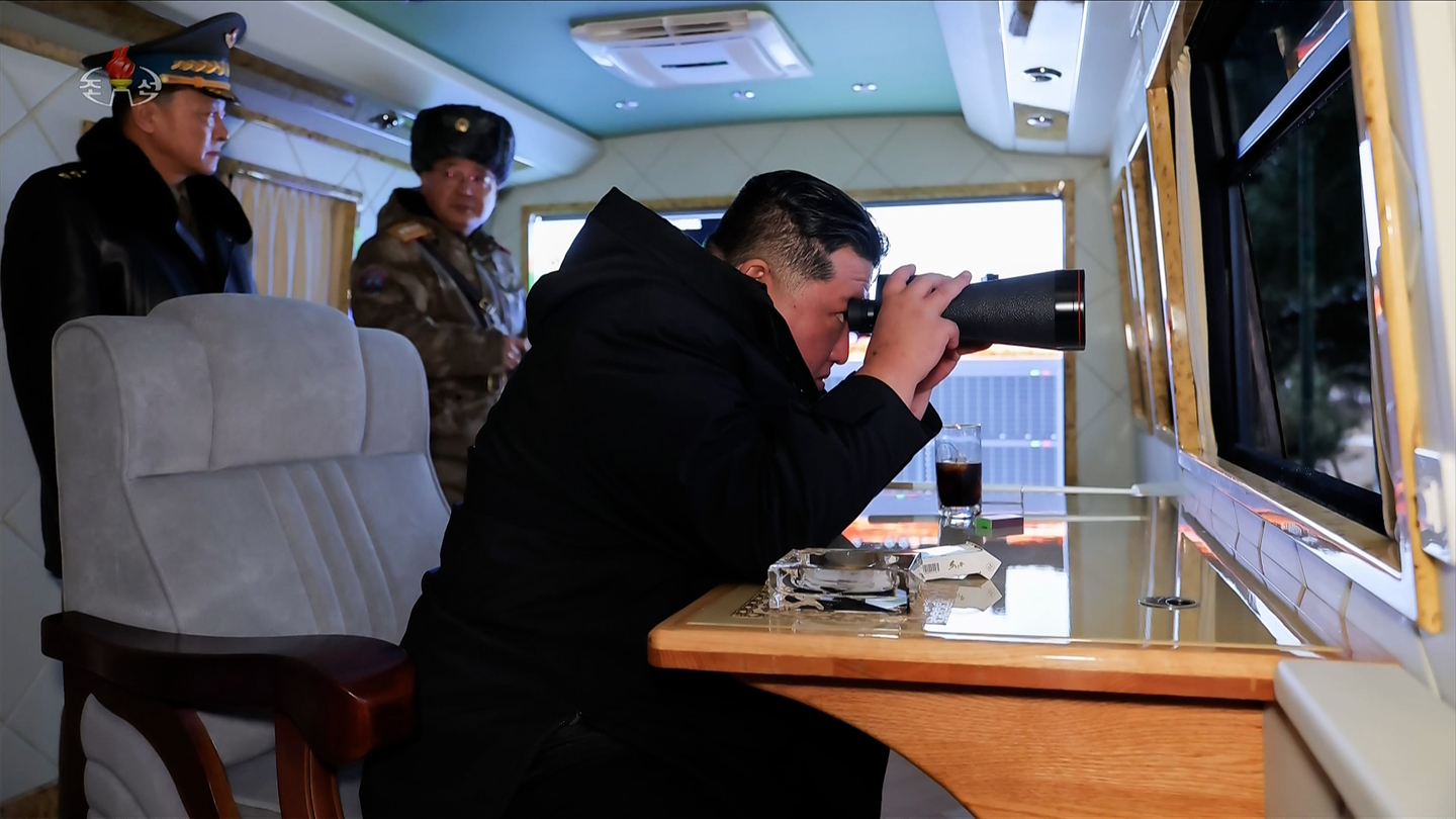North Korean leader Kim Jong-un is seen overseeing the launch of a new surface-to-air missile on Dec. 24. [KOREAN CENTRAL NEWS AGENCY]