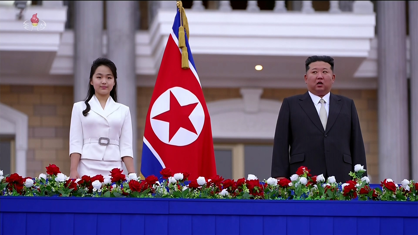 North Korean leader Kim Jong-un, right, and his daughter, Ju-ae, attend the inauguration ceremony for the Wonsan-Kalma coastal tourist zone on June 24 in this image provided by the state-run Korean Central Television on June 26. [KOREAN CENTRAL TELEVISION] 