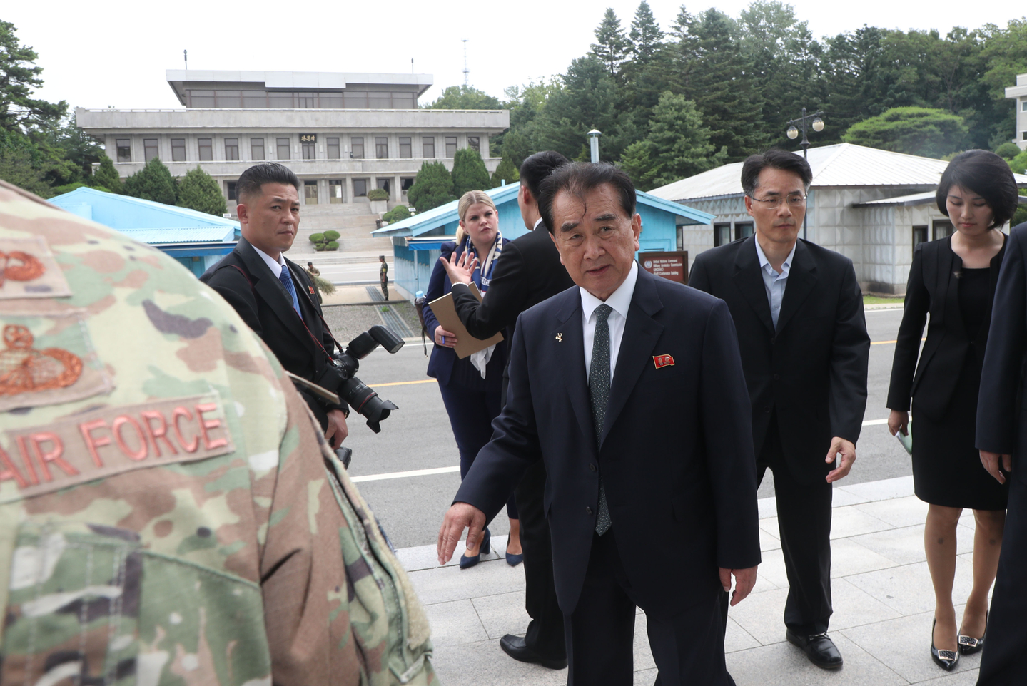 Kim Chang-son, the late department director of the State Affairs Commission of North Korea, center, is seen during North Korean leader Kim Jong-un's summit with U.S. President Donald Trump at the border village of Panmunjom on June 30, 2019. [JOINT PRESS CORPS]