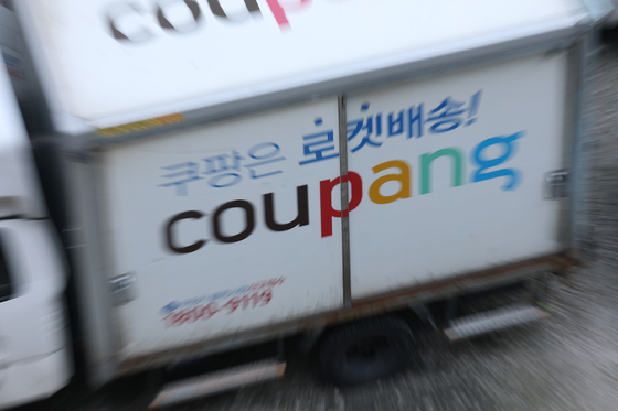 A Coupang truck sits in a parking lot in Seoul on Dec. 25. [YONHAP]