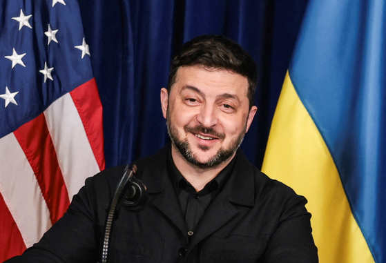 Ukrainian President Volodymyr Zelensky reacts during a press conference with U.S. President Donald Trump, after their lunch meeting at Trump's Mar-a-Lago club, in Palm Beach, Florida, Dec. 28. [REUTERS/YONHAP]