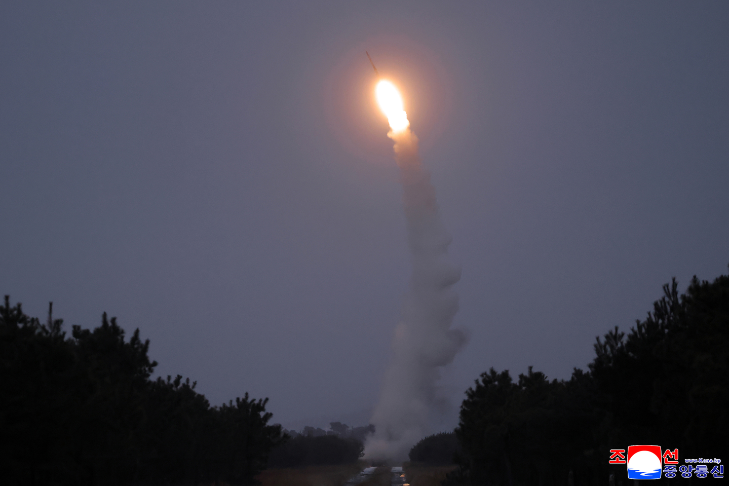 North Korea fires a new long-range anti-air missile into the East Sea on Dec. 24, in this photo carried by the North's official Korean Central News Agency the following day. [YONHAP] 