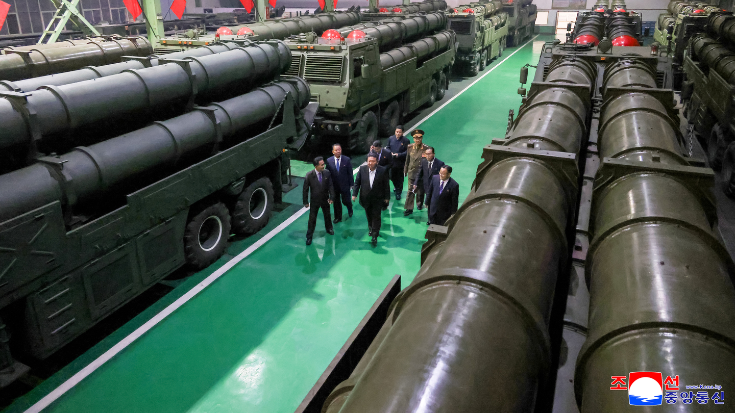 North Korean leader Kim Jong-un inspects major munitions factories while calling for expanding the production of missiles and shells, in this photo carried by the North's official Korean Central News Agency on Dec. 30. [KCNA]