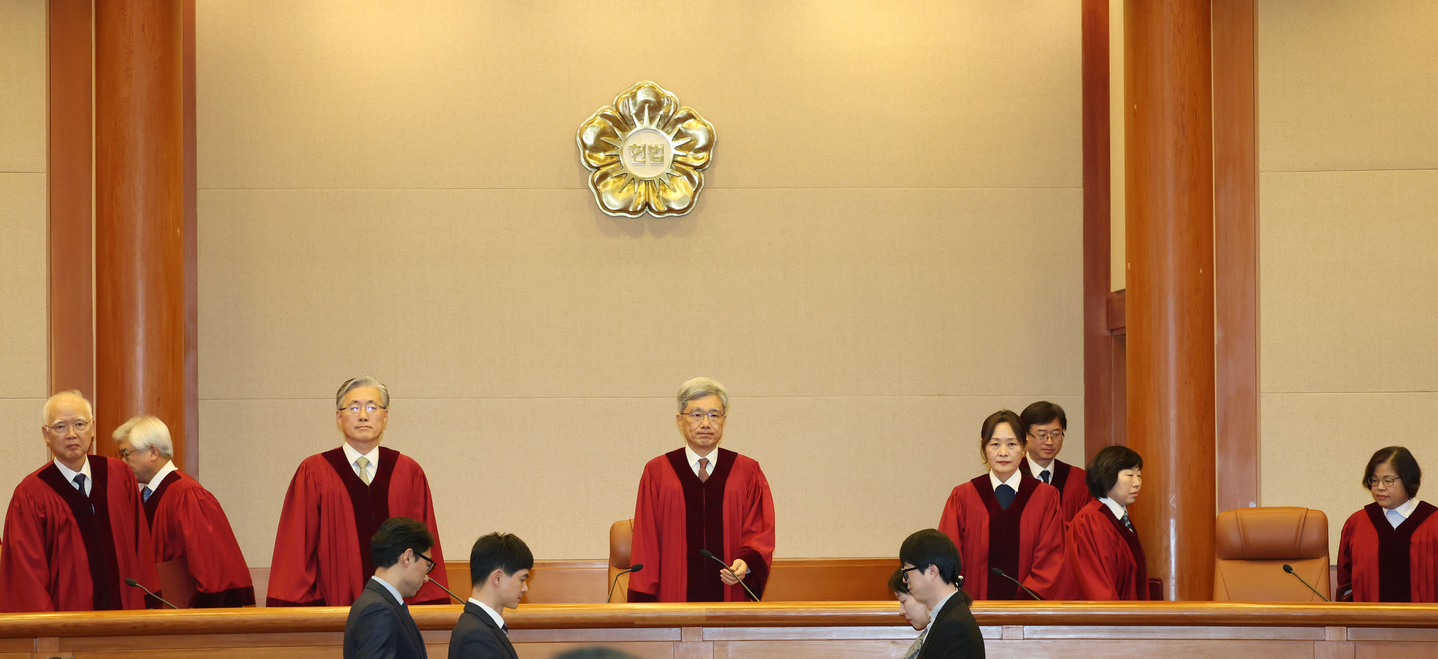 Presiding justices of the Constitutional Court take their seats during a court session on Dec. 1, 2025. [NEWS1] 