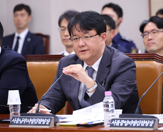 Kim Tae-hoon, chief of the Seoul Southern District Prosecutors' Office, attends a parliamentary session at the National Assembly in western Seoul on Oct. 23, 2025. [YONHAP]