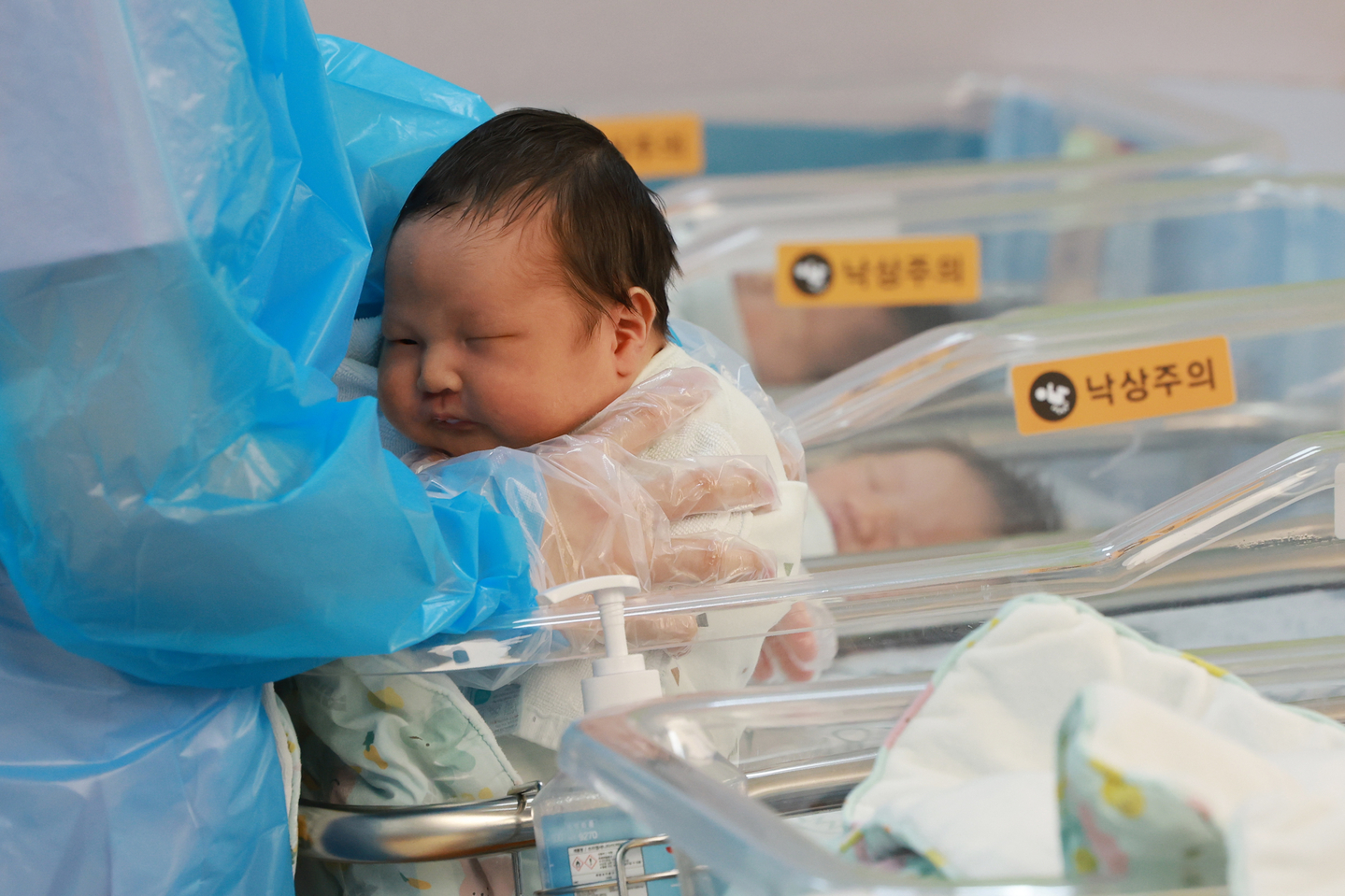 A nurse looks after a newborn baby at the CHA Ilsan Medical Center in Goyang, Gyeonggi, on July 24, 2025. [YONHAP]