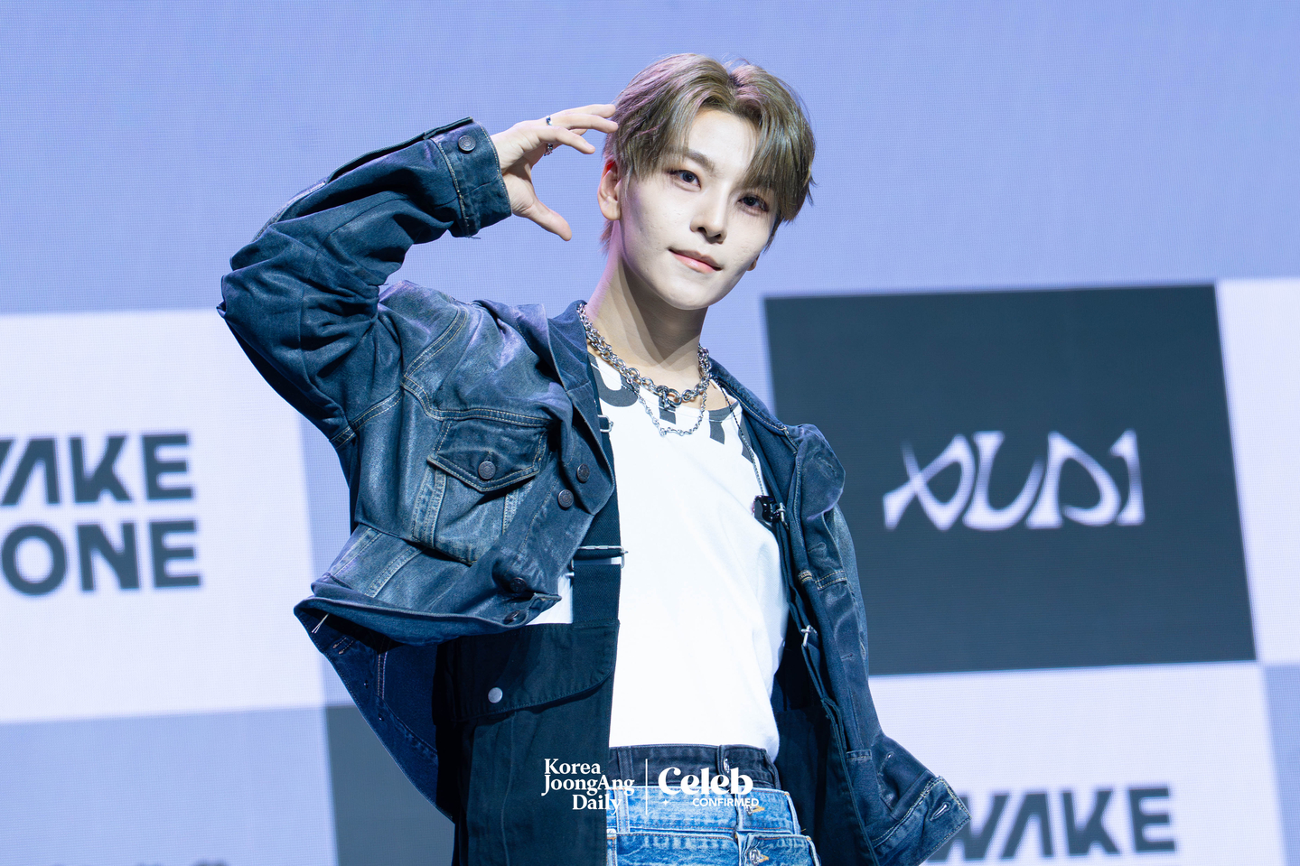 Alpha Drive One’s Xinlong poses for photos during a showcase for the release of the group’s first EP, ″Euphoria,″ at Blue Square in central Seoul on Jan. 12. [DANIELA GONZALEZ PEREZ]