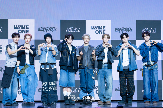 Alpha Drive One poses for photos during a showcase for the release of its first EP, ″Euphoria,″ at Blue Square in central Seoul on Jan. 12. [DANIELA GONZALEZ PEREZ]