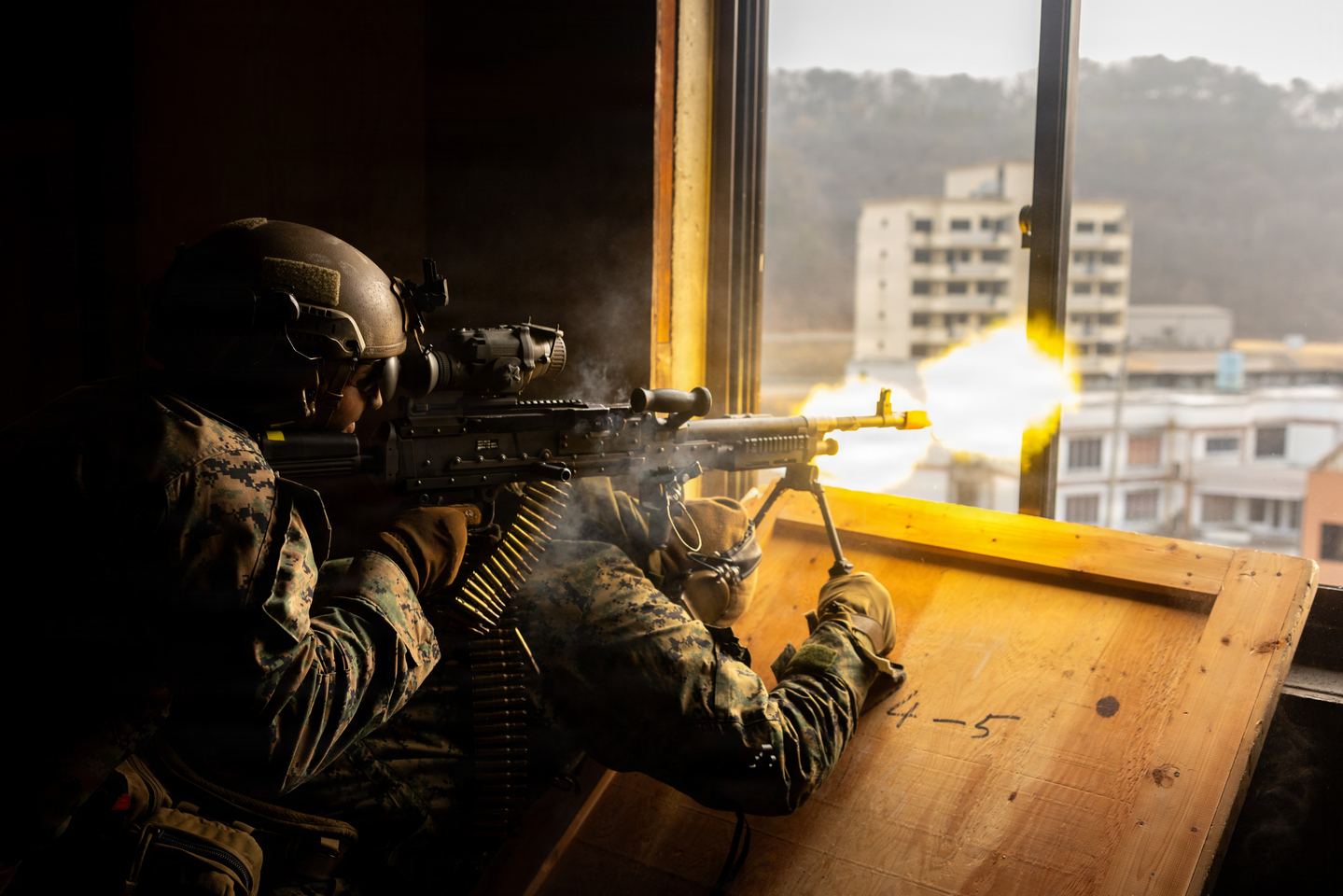 This file photo from the Pentagon's Defense Visual Information Distribution Service shows the 1st Battalion, 6th Marines, forward deployed with 4th Marine Regiment, 3rd Marine Division as part of the Unit Deployment Program firing on simulated adversary forces at Rodriguez Live Fire Complex in Pocheon, some 45 kilometers north of Seoul, on Dec. 17, 2025. [PENTAGON DEFENSE VISUAL INFORMATION DISTRIBUTION SERVICE] 