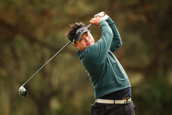 Korean golfer Lee Seung-taek plays his shot from the eighth tee during the second round of PGA TOUR Q-School presented by Korn Ferry on Dye's Valley Course at TPC Sawgrass on Dec. 13, 2024, in Ponte Vedra Beach, Florida. [GETTY IMAGES] 