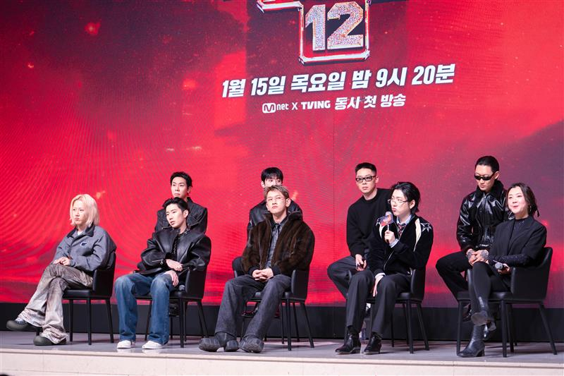 Musicians featuring as producers of the twelfth season of Mnet's ″Show Me The Money″ hip-hop competition program, alongside the show's chief producer Choi Hyo-jin, far right on the front row, attend a press conference held in southern Seoul on Jan. 15. [DANIELA GONZALEZ PEREZ]