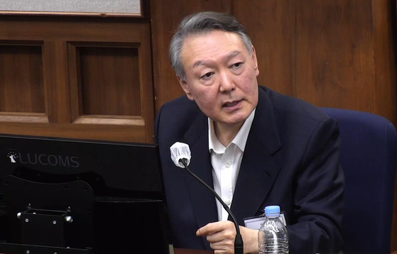 Former President Yoon Suk Yeol speaks during a trial hearing on insurrection charges at the Seoul Central District Court in southern Seoul on Dec. 29, 2025. [YONHAP]