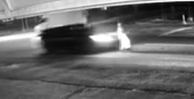 A pedestrian is seen crossing a street in Seonggeo-eup, Seobuk District in Cheonan, South Chungcheong, seconds before being hit by a drunk driver, in this screen capture from Yonhap News TV [SCREEN CAPTURE]