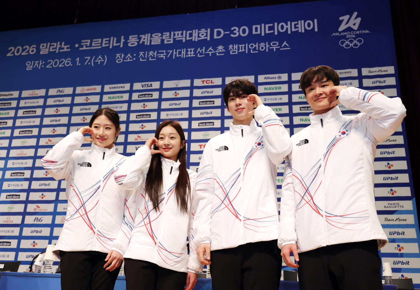 Korean figure skaters set to compete at the 2026 Milan-Cortina Winter Olympics pose for photos after their joint press conference at the Jincheon National Training Center in Jincheon, North Chungcheong on Jan. 7. From left: Lee Hae-in, Shin Ji-a, Cha Jun-hwan and Kim Hyun-gyeom. [YONHAP]