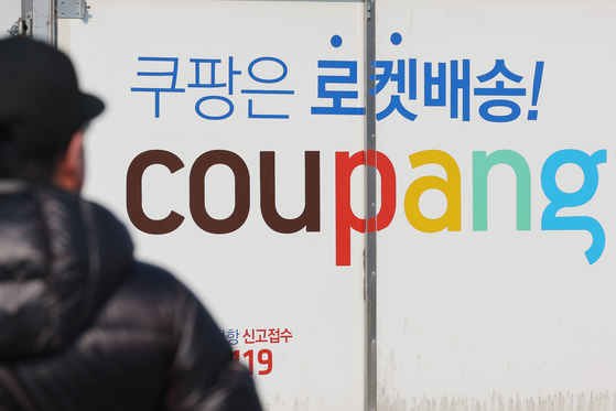 The Coupang logo is seen on a delivery truck at the company's logistics center in Seoul on Jan. 23. [YONHAP]