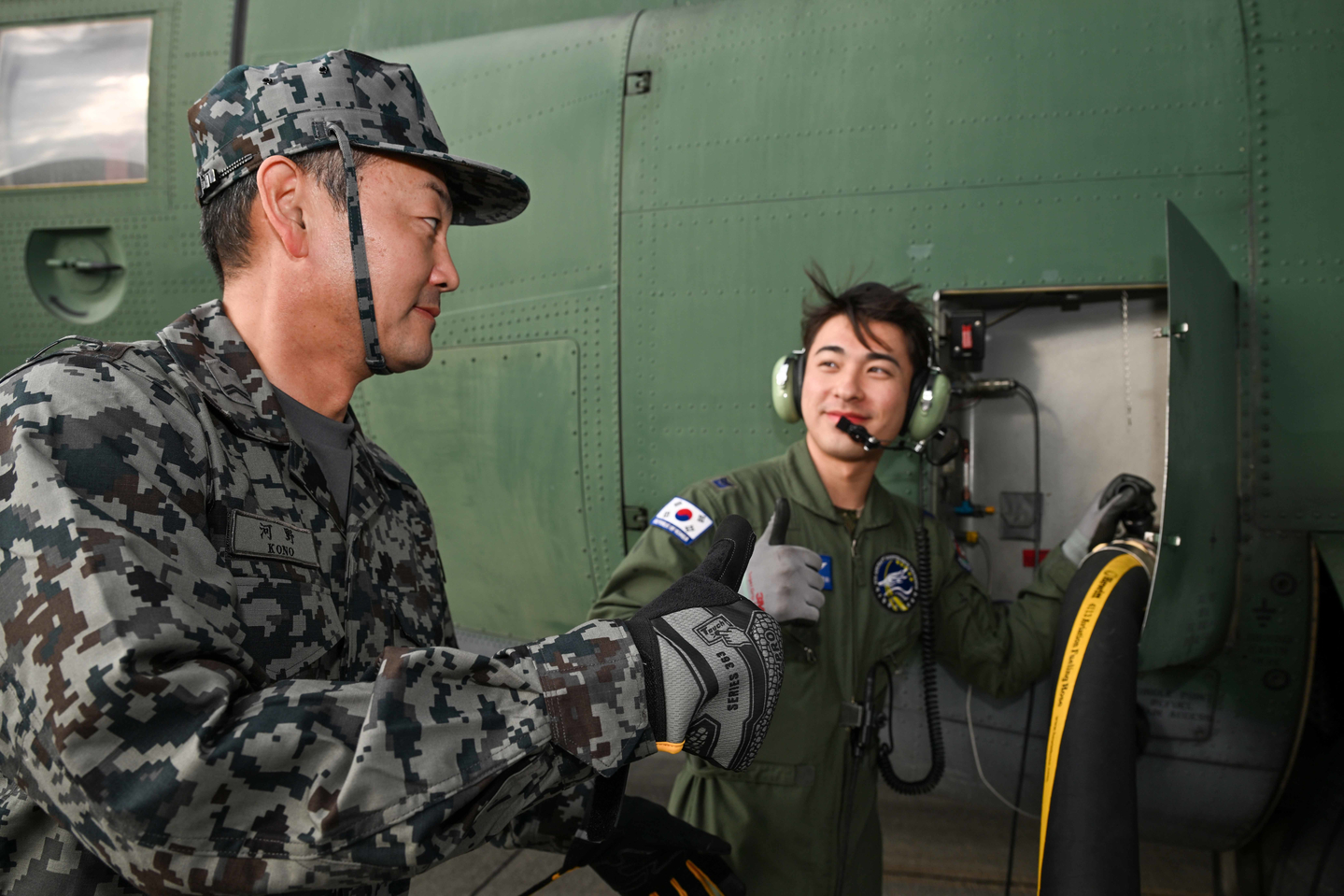 A C-130 transport aircraft refueling with support from the Japan Air Self-Defense Force after landing at Naha Air Base in Japan on Jan. 28. [REPUBLIC OF KOREA AIR FORCE]