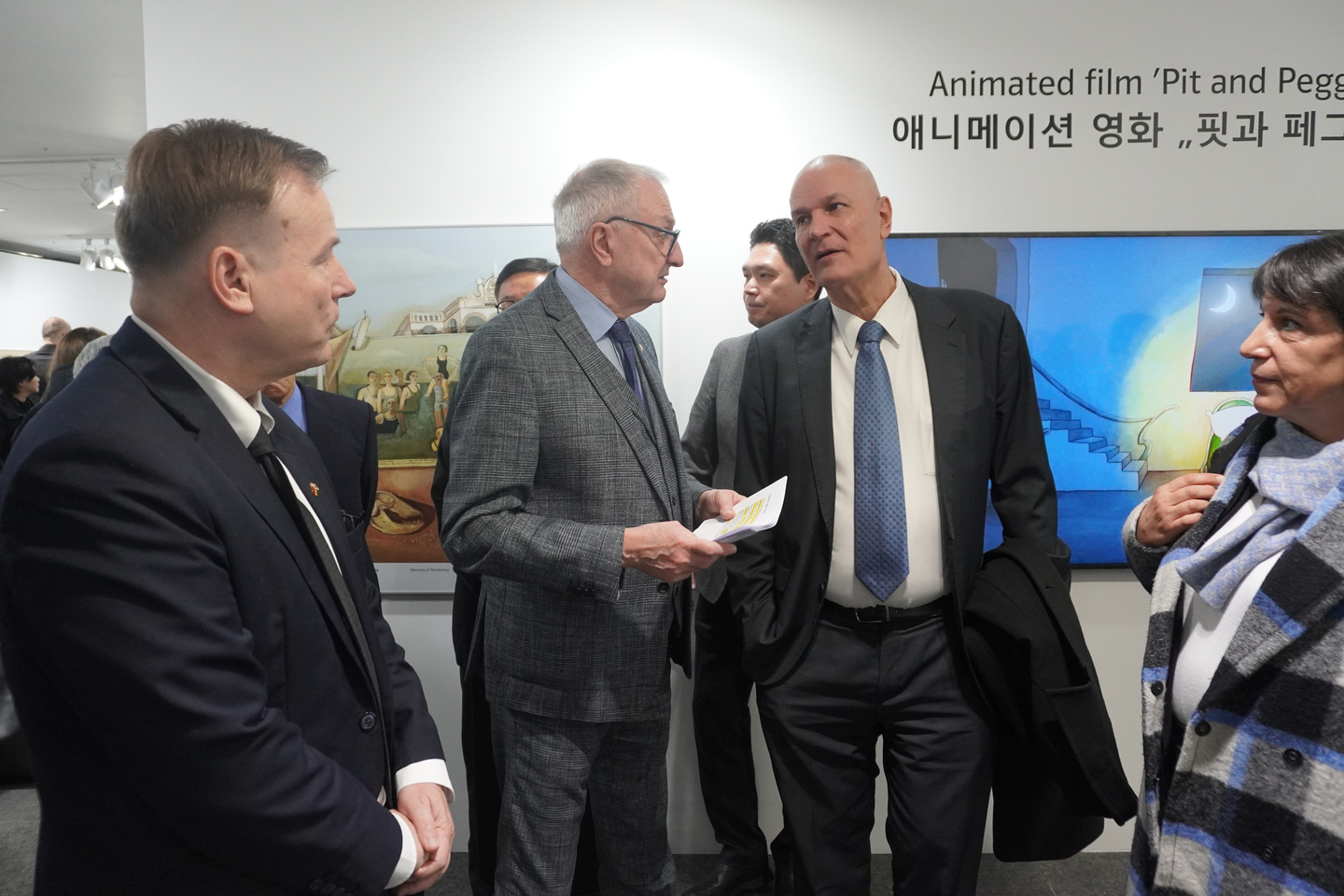 German Ambassador to Korea Georg Schmidt, left, and Felix Nussbaum Foundation Chair Heiko Schlatermund, second from left, listen to Israeli Ambassador to Korea Rafael Harpaz, second from right, at the National Museum of Korean Democracy in Yongsan District, central Seoul, on Jan. 27, following an International Holocaust Remembrance Day ceremony hosted by the German and Israeli embassies. Felix Nussbaum’s artworks are being shown in Korea for the first time as part of the “Remembering for the Future” exhibition at the museum, which opened on Jan. 28 and runs through March 15. At the ceremony, Schmidt expressed hope that the exhibition would allow visitors to “see and feel the suffering and the horror” experienced by Nussbaum and other Holocaust victims. Harpaz warned that “hatred toward Jews did not disappear after 1945” but has “persisted” and “has even been intensifying” in recent years. [EMBASSY OF ISRAEL]