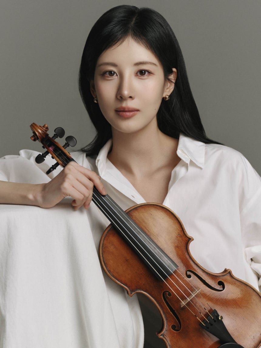 Seohyun of Girl's Generation poses with a violin [KKUM ENT]