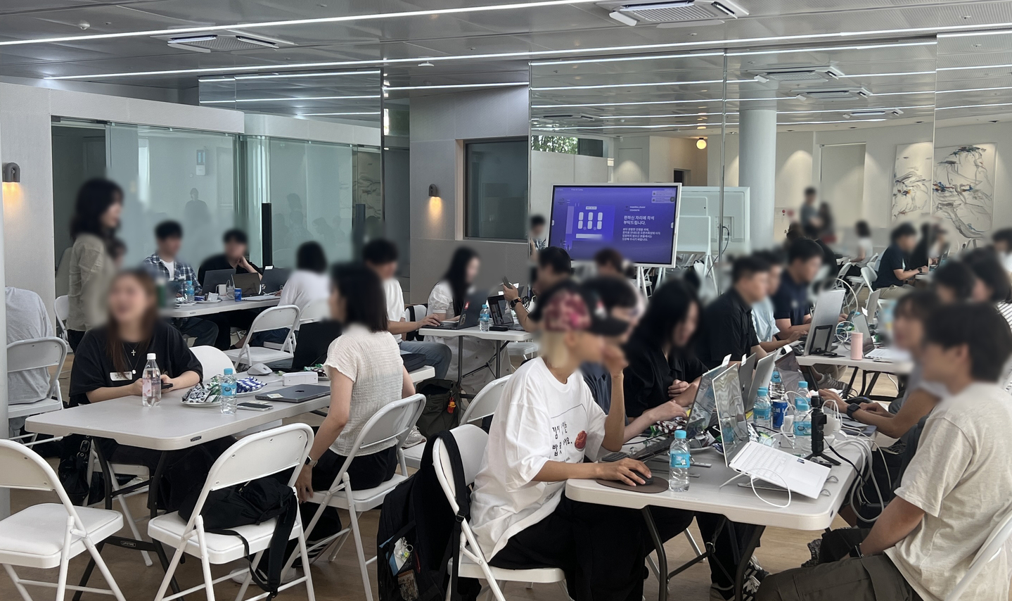 AI creators are seen talking to each other during an AI Content Creator Camp hosted by A2O Entertainment [A20 ENTERTAINMENT]