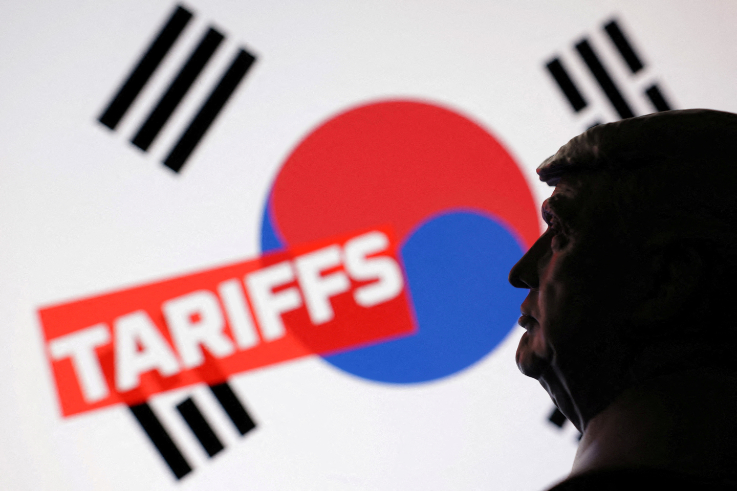 A 3D-printed miniature model of U.S. President Donald Trump, the Korean flag and the word ″Tariffs″ are seen in this illustration taken on July 23, 2025. [REUTERS/YONHAP]
