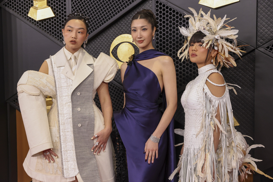 From left, Audrey Nuna, EJAE, and Rei Ami, the singing voices behind HUNTR/X attend the red carpet for the 68th annual Grammy Awards ceremony at Crypto.com Arena in Los Angeles, California, on Feb. 1. [EPA/YONHAP]