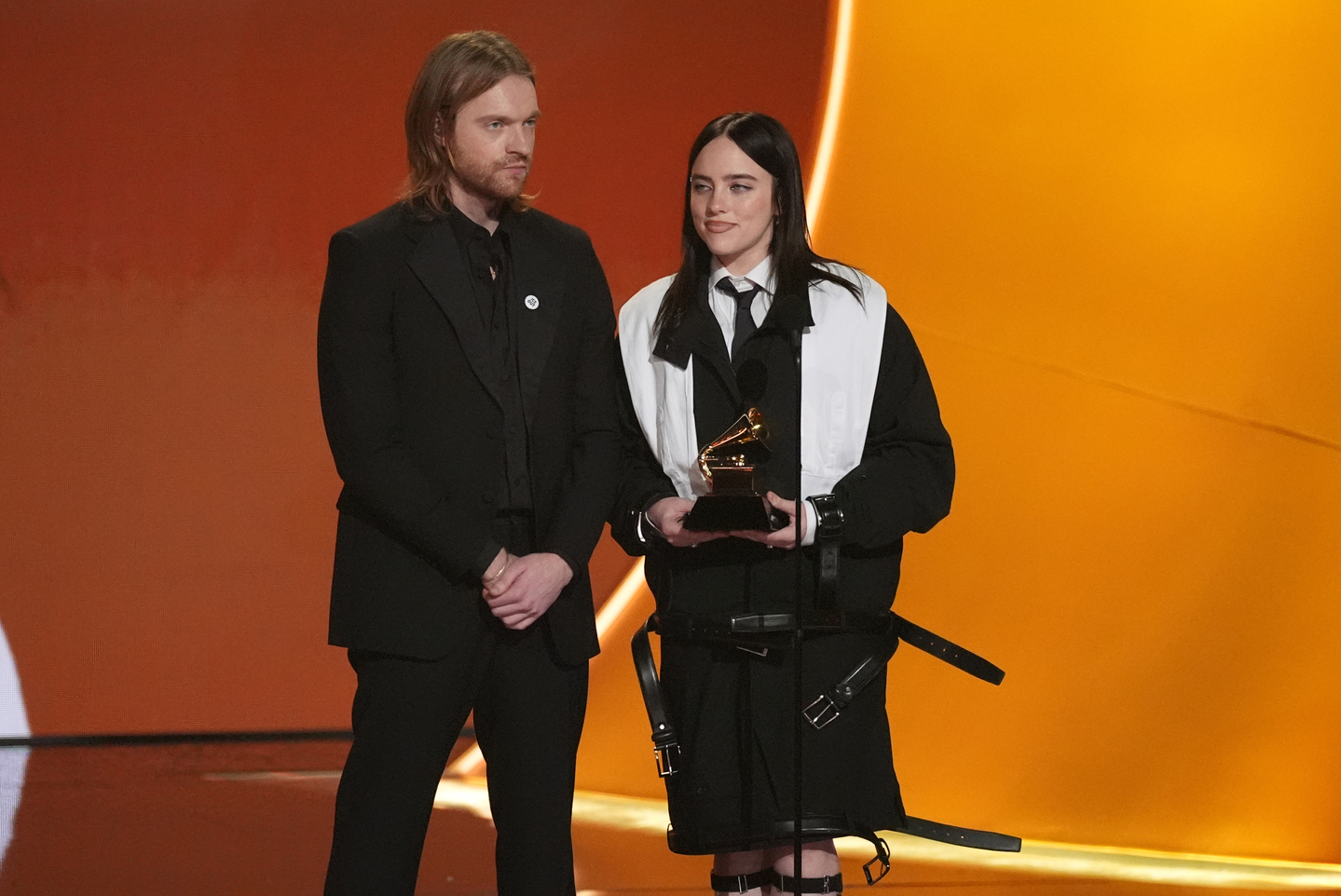 Finneas, left, and Billie Eilish accept the award for song of the year for ″Wildflower″ (2024) during the 68th Annual Grammy Awards in Los Angeles on Feb. 1. [AP/YONHAP]
