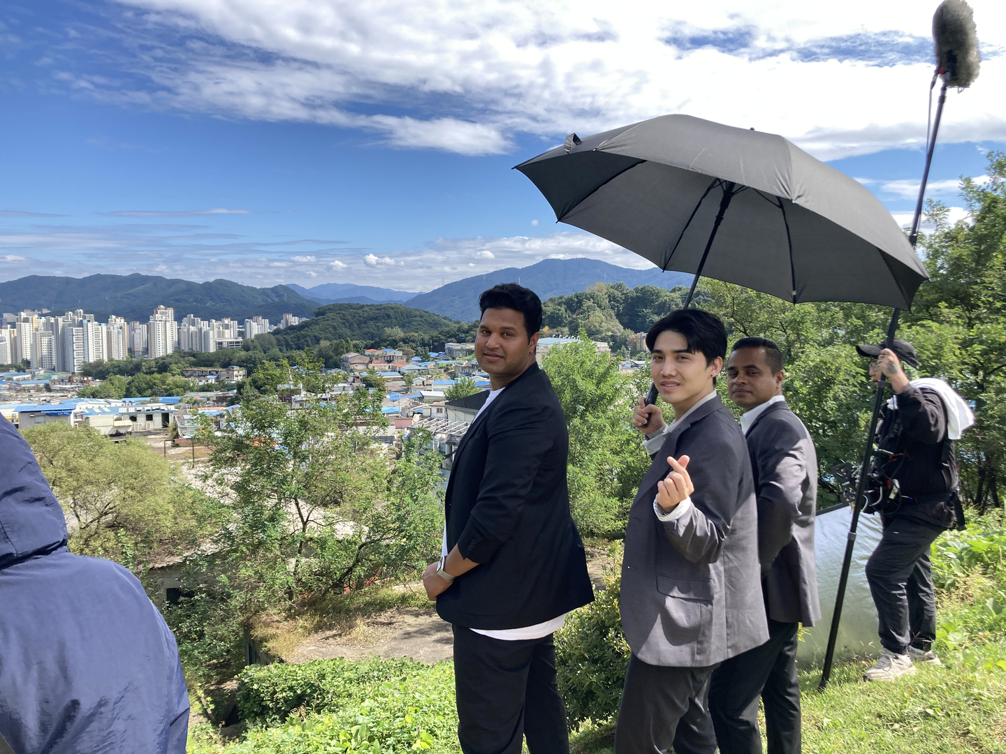 Le Anh Ton poses for a photo with fellow actors during the filming of independent film “Drained by Dreams” (2025). [LE ANH TON]