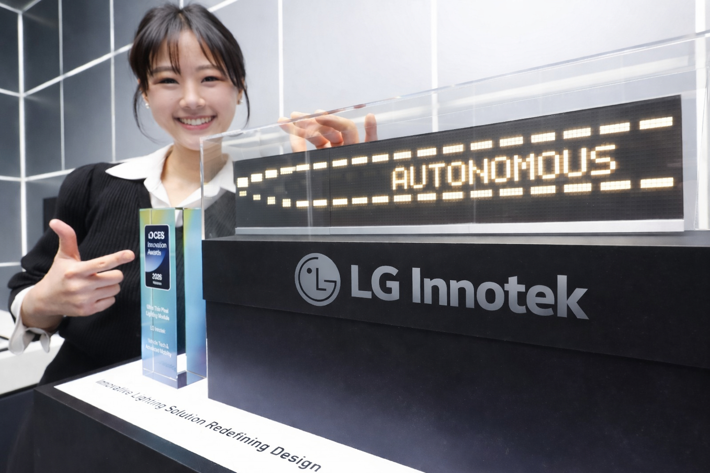 LG Innotek employee demonstrates vehicle lighting technology known as the ″Nexlide Pixel″ [LG INNOTEK]