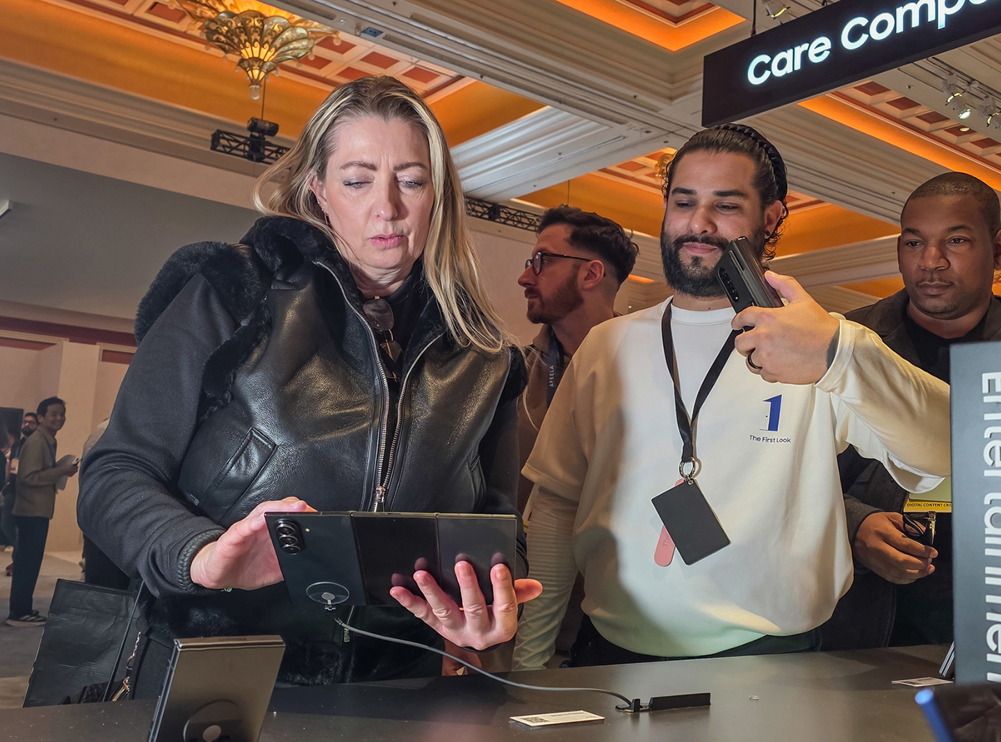 Visitors look at the Galaxy Z TriFold at Samsung Electronics’ booth at the Wynn Hotel in Las Vegas on Jan. 6, the opening day of CES 2026, the world’s largest IT and consumer electronics trade show. [SAMSUNG ELECTRONICS]