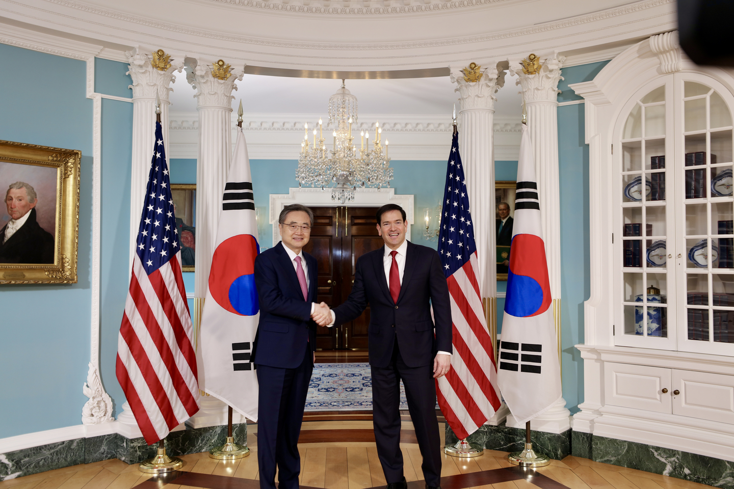 Korea’s Minister of Foreign Affairs Cho Hyun, left, and U.S. Secretary of State Marco Rubio shake hands upon meeting for bilateral talks at the State Department in Washington on Feb. 3. [JOINT PRESS CORPS]