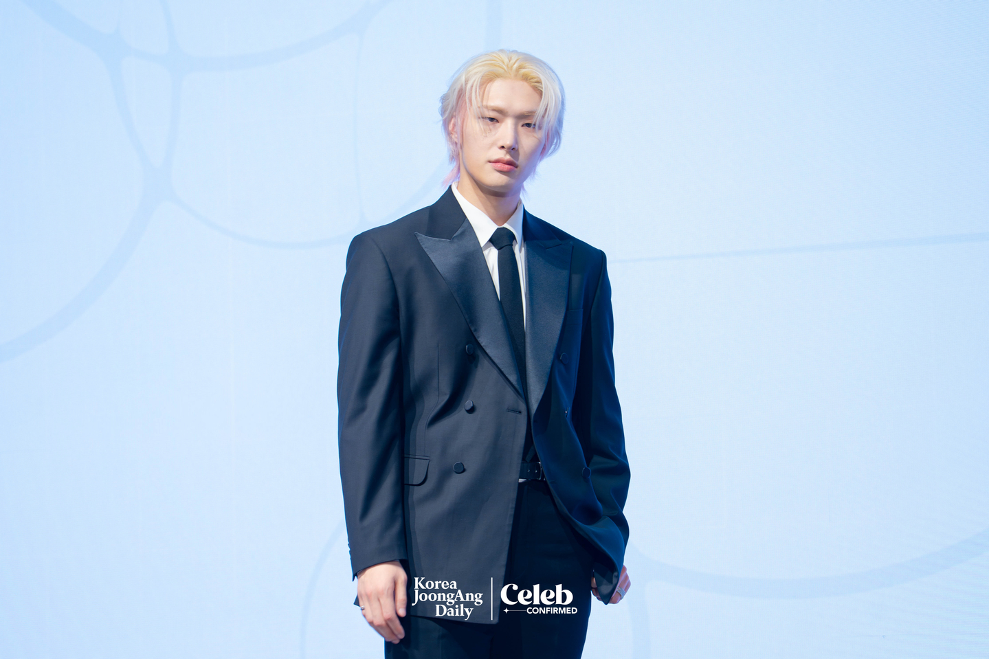 Ateez’s Mingi poses for photos during a press conference for the release of the group’s 13th EP, “Golden Hour: Part.4,” at the Fairmont Ambassador Seoul in western Seoul on Feb. 5. [DANIELA GONZALEZ PEREZ]