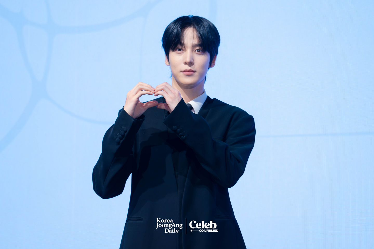 Ateez’s Yunho poses for photos during a press conference for the release of the group’s 13th EP, “Golden Hour: Part.4,” at the Fairmont Ambassador Seoul in western Seoul on Feb. 5. [DANIELA GONZALEZ PEREZ]