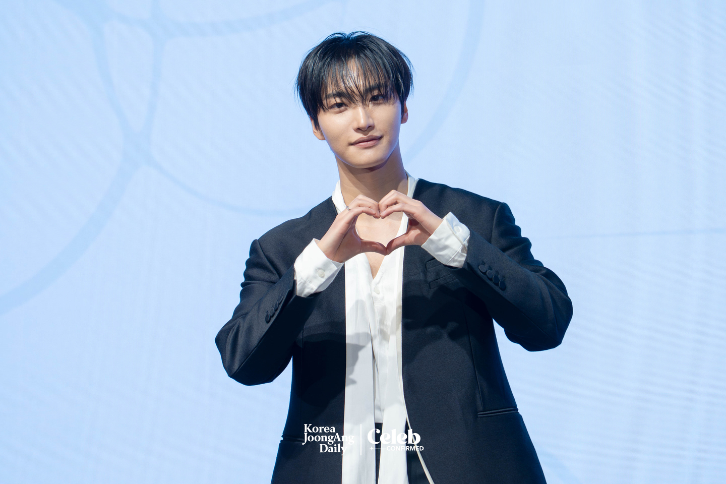 Ateez’s Seonghwa poses for photos during a press conference for the release of the group’s 13th EP, “Golden Hour: Part.4,” at the Fairmont Ambassador Seoul in western Seoul on Feb. 5. [DANIELA GONZALEZ PEREZ]