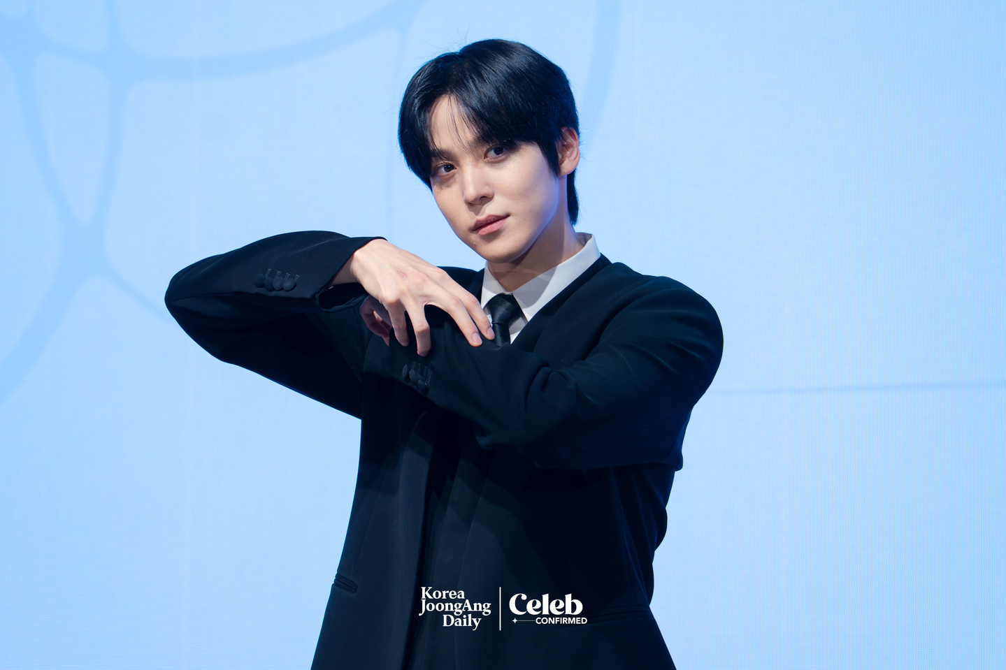 Ateez’s Yunho poses for photos during a press conference for the release of the group’s 13th EP, “Golden Hour: Part.4,” at the Fairmont Ambassador Seoul in western Seoul on Feb. 5. [DANIELA GONZALEZ PEREZ]