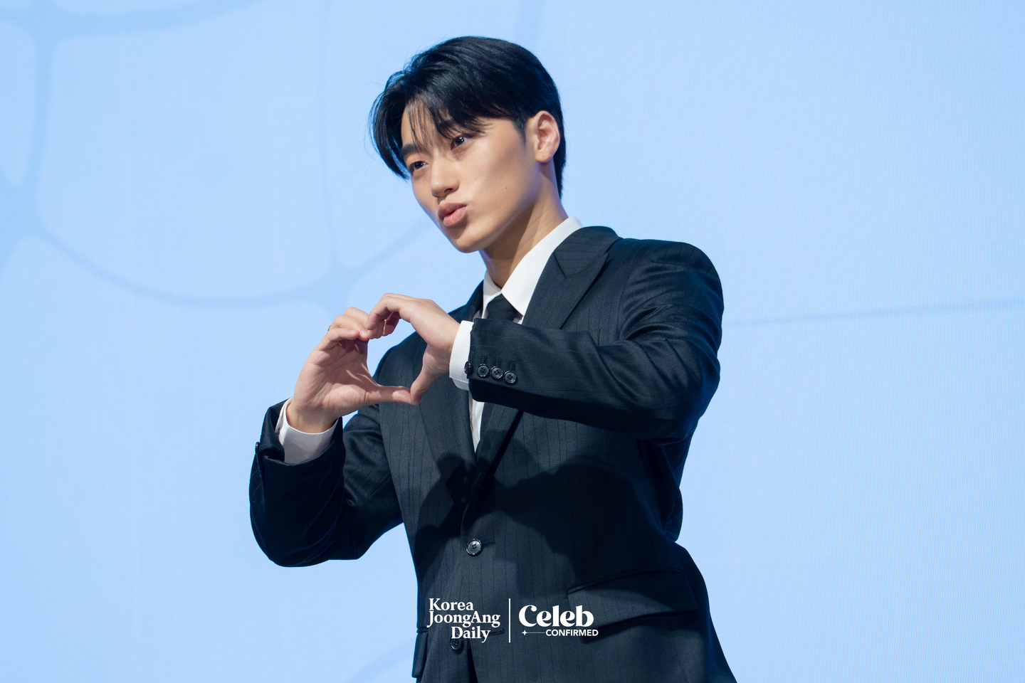 Ateez’s San poses for photos during a press conference for the release of the group’s 13th EP, “Golden Hour: Part.4,” at the Fairmont Ambassador Seoul in western Seoul on Feb. 5. [DANIELA GONZALEZ PEREZ]