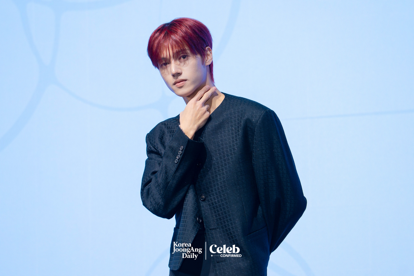 Ateez’s Wooyoung poses for photos during a press conference for the release of the group’s 13th EP, “Golden Hour: Part.4,” at the Fairmont Ambassador Seoul in western Seoul on Feb. 5. [DANIELA GONZALEZ PEREZ]