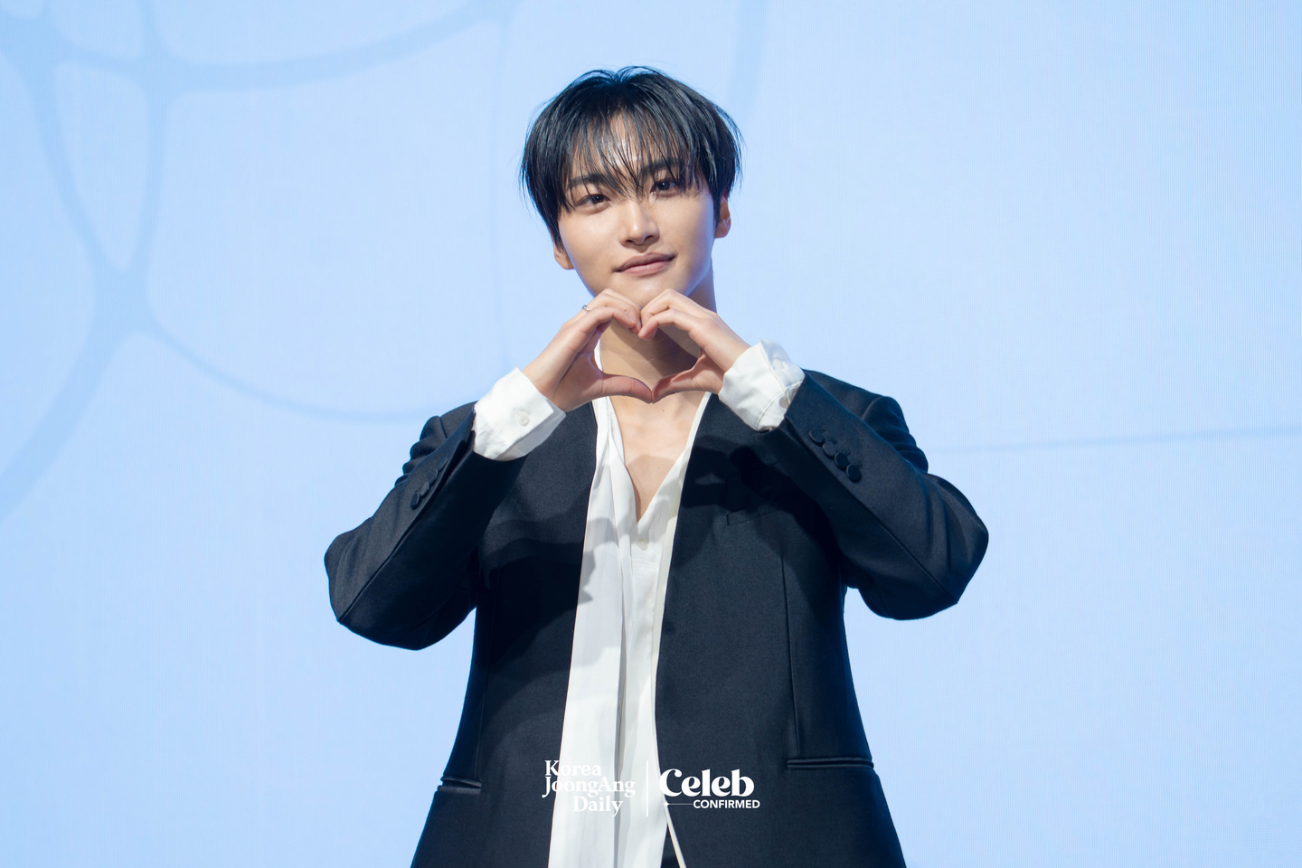 Ateez’s Seonghwa poses for photos during a press conference for the release of the group’s 13th EP, “Golden Hour: Part.4,” at the Fairmont Ambassador Seoul in western Seoul on Feb. 5. [DANIELA GONZALEZ PEREZ]