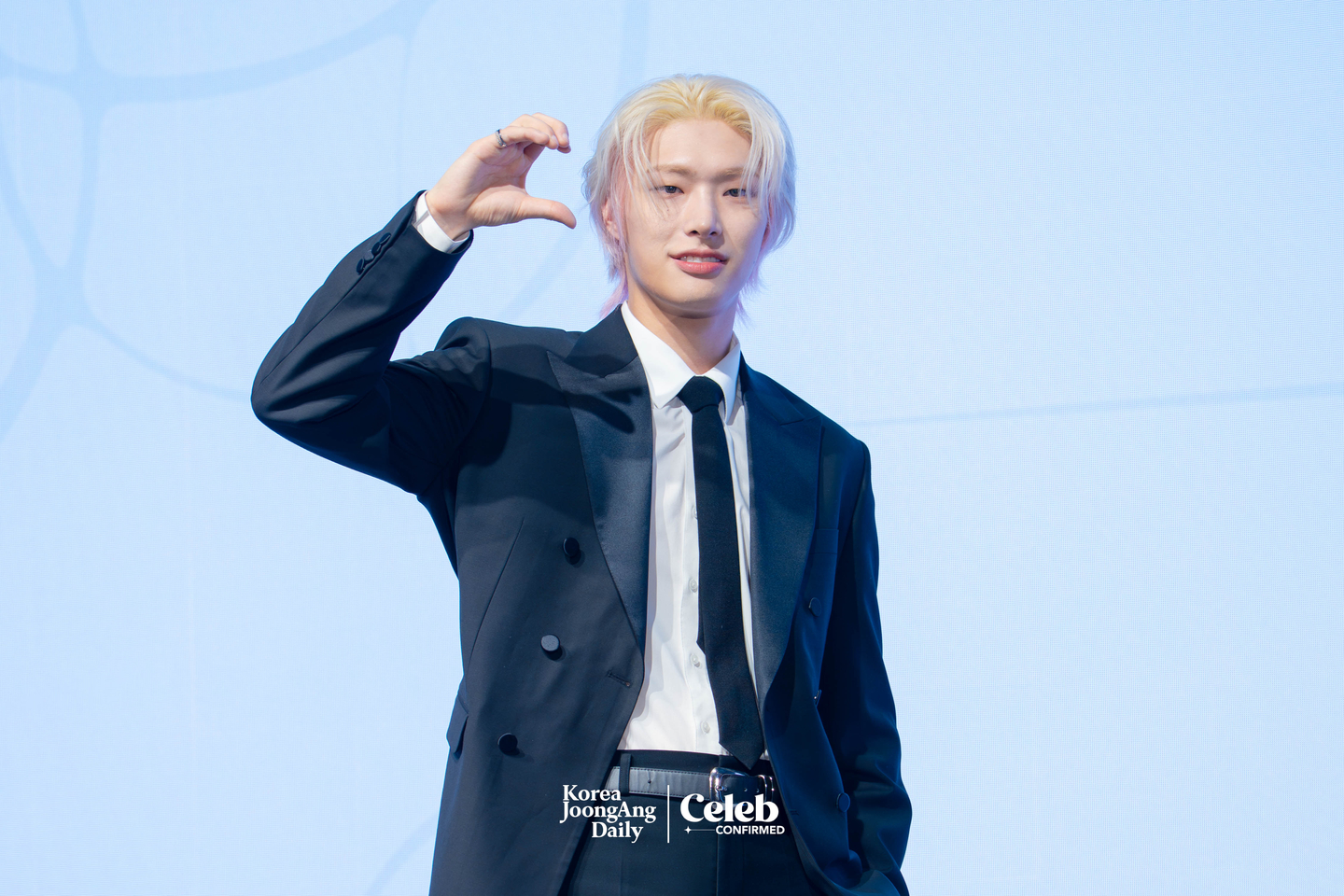 Ateez’s Mingi poses for photos during a press conference for the release of the group’s 13th EP, “Golden Hour: Part.4,” at the Fairmont Ambassador Seoul in western Seoul on Feb. 5. [DANIELA GONZALEZ PEREZ]