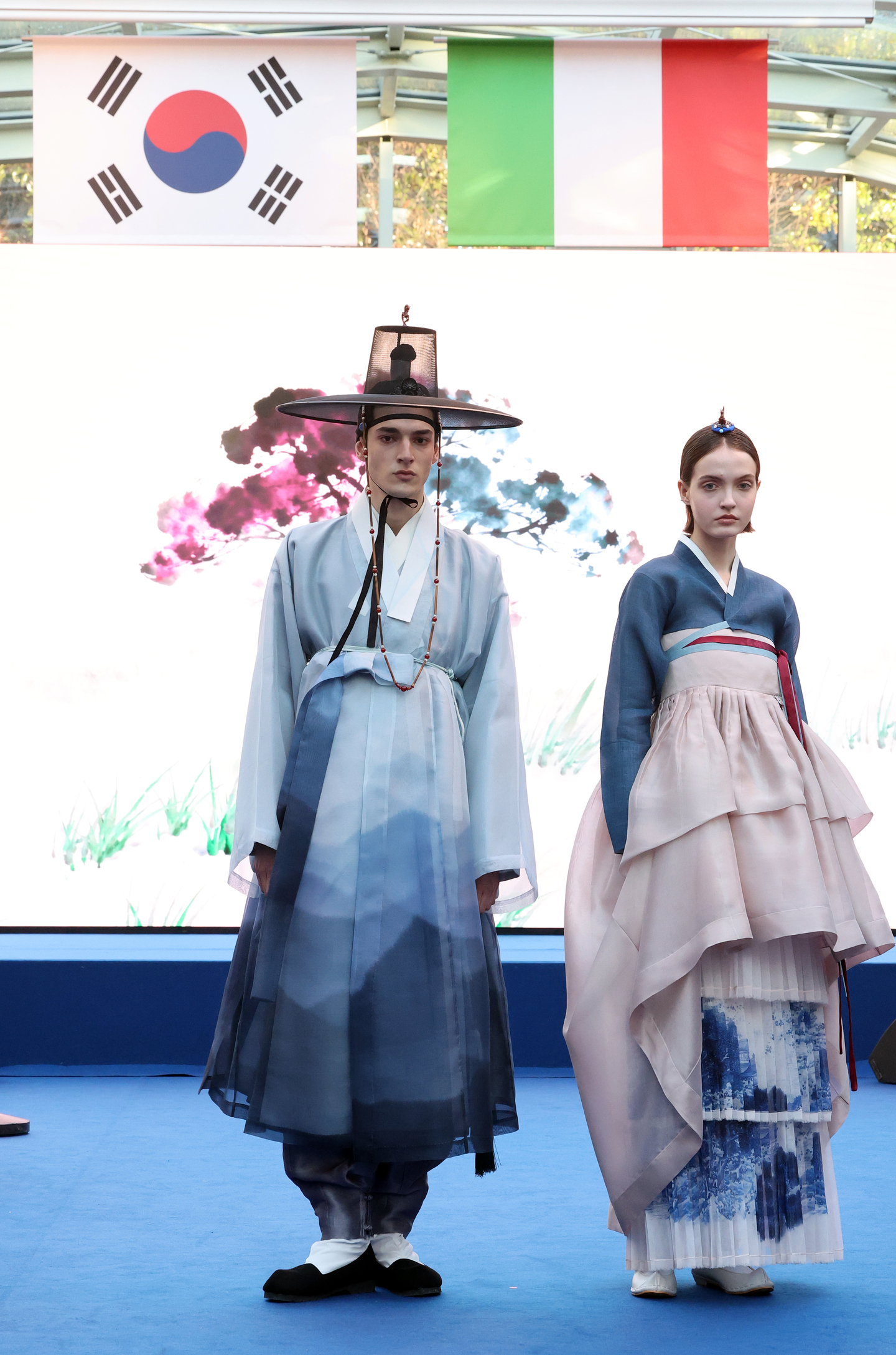 A hanbok (traditional Korean dress) fashion show takes place during the opening ceremony for Korea House, Korea's hospitality space for the 2026 Winter Olympics, at Villa Necchi Campiglio in Milan on Feb. 5. [YONHAP]