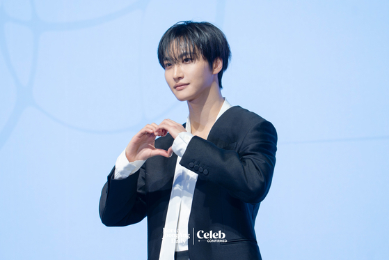 Ateez’s Seonghwa poses for photos during a press conference for the release of the group’s 13th EP, “Golden Hour: Part.4,” at the Fairmont Ambassador Seoul in western Seoul on Feb. 5. [DANIELA GONZALEZ PEREZ]