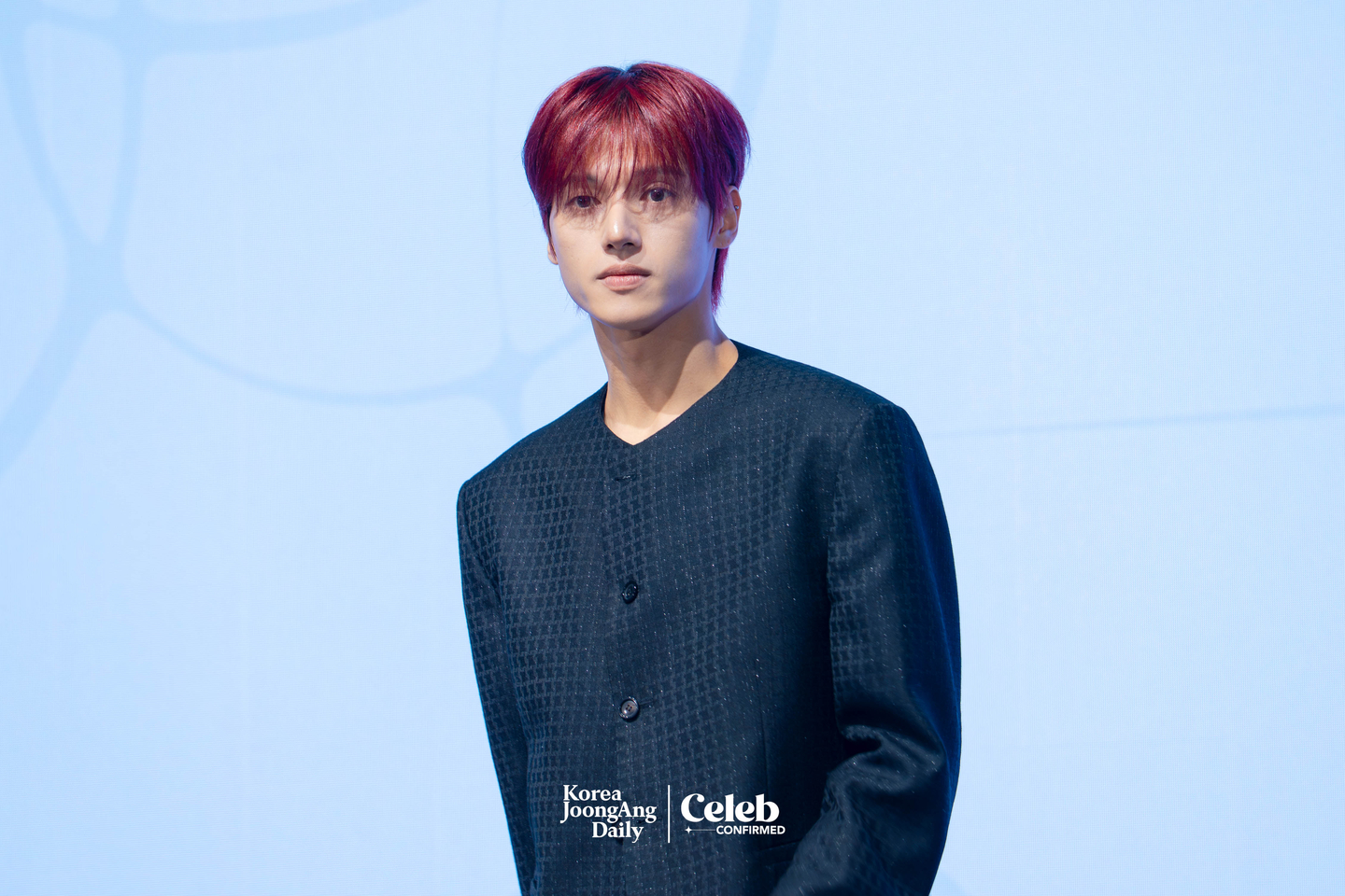 Ateez’s Wooyoung poses for photos during a press conference for the release of the group’s 13th EP, “Golden Hour: Part.4,” at the Fairmont Ambassador Seoul in western Seoul on Feb. 5. [DANIELA GONZALEZ PEREZ]