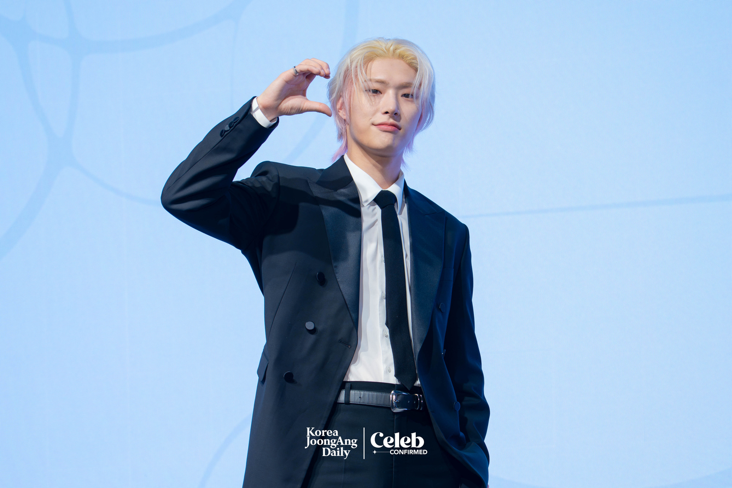 Ateez’s Mingi poses for photos during a press conference for the release of the group’s 13th EP, “Golden Hour: Part.4,” at the Fairmont Ambassador Seoul in western Seoul on Feb. 5. [DANIELA GONZALEZ PEREZ]