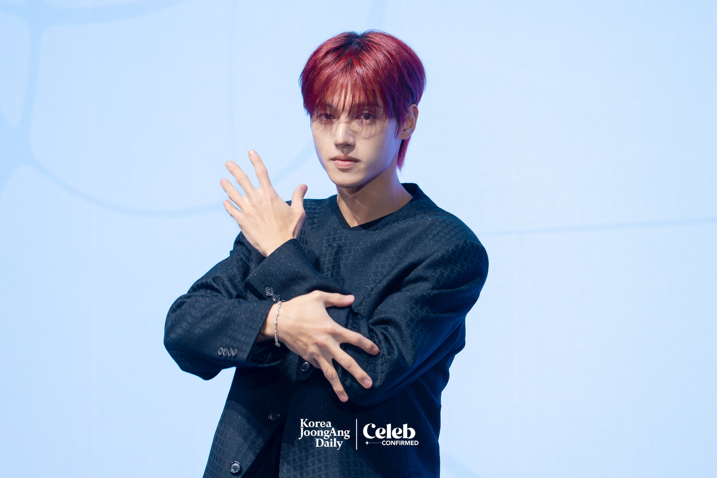 Ateez’s Wooyoung poses for photos during a press conference for the release of the group’s 13th EP, “Golden Hour: Part.4,” at the Fairmont Ambassador Seoul in western Seoul on Feb. 5. [DANIELA GONZALEZ PEREZ]