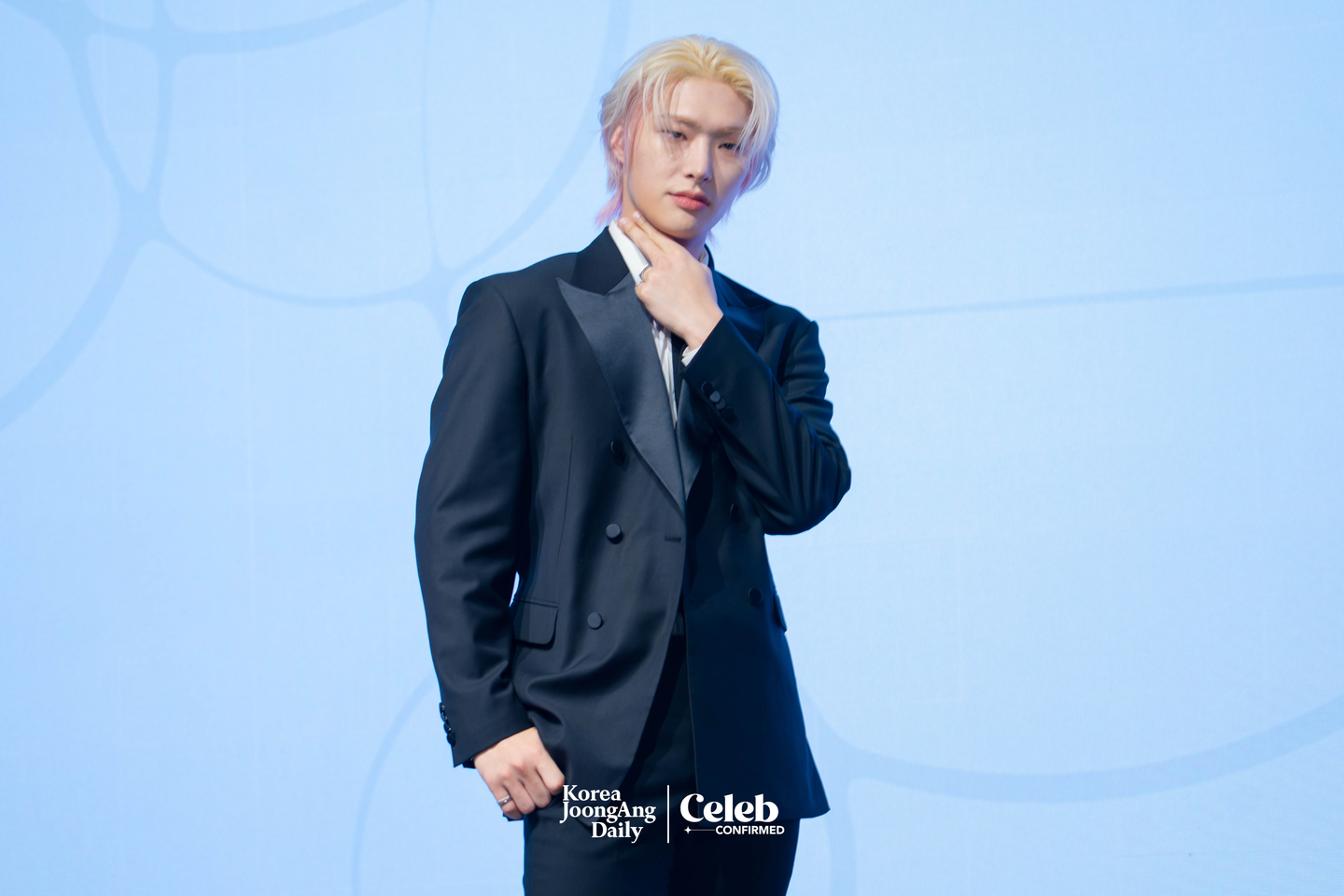 Ateez’s Mingi poses for photos during a press conference for the release of the group’s 13th EP, “Golden Hour: Part.4,” at the Fairmont Ambassador Seoul in western Seoul on Feb. 5. [DANIELA GONZALEZ PEREZ]